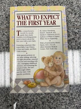 What to Expect the First Year - Baby Care Guide in Yellow and Cream